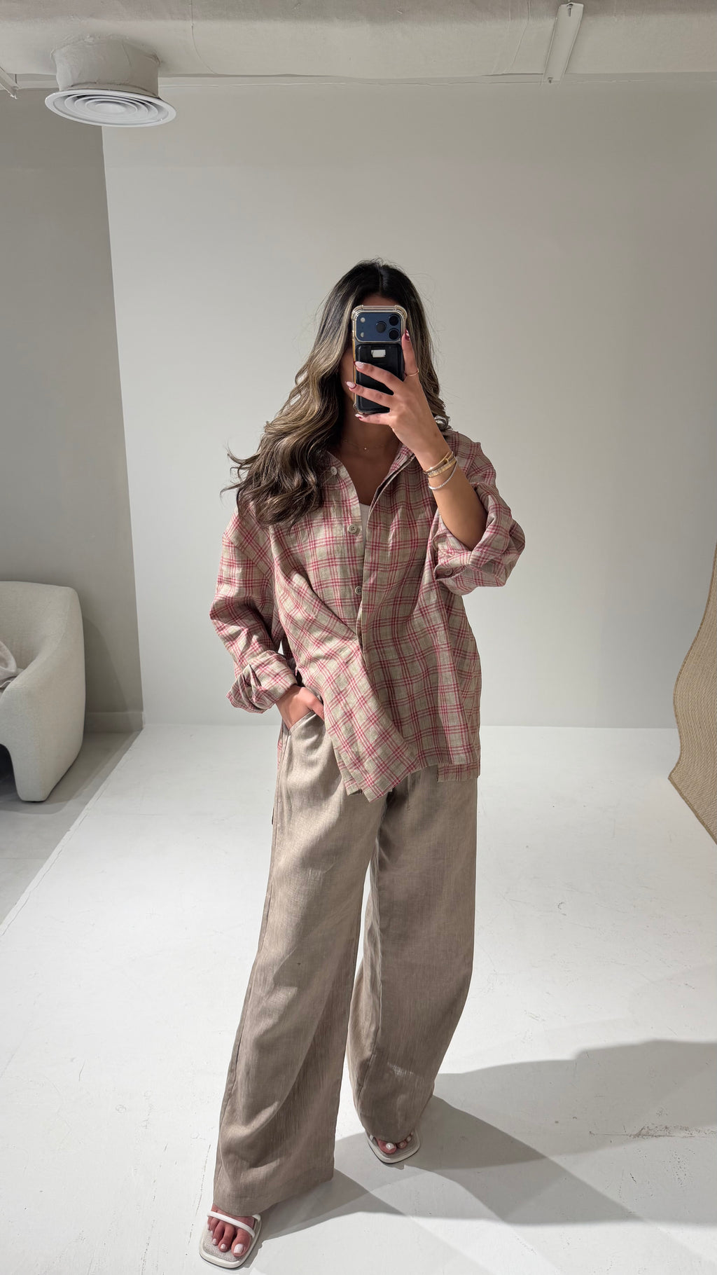 Checkered overlap shirt with beige linen pants