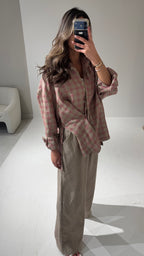 Checkered overlap shirt with beige linen pants